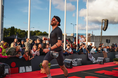Dan Furze at the finish chute of Ironman Tallin, 2025